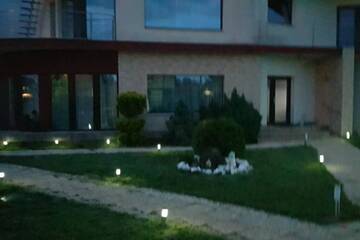 Фото номера Дом с 4 спальнями Дома для отпуска Vila de lux г. Dumbrăviţa 38
